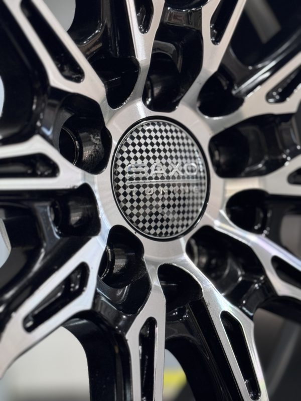 Rines r16x7 5x100 5x112 5x114.3 D2853 Saxo Black Polished - Imagen 5